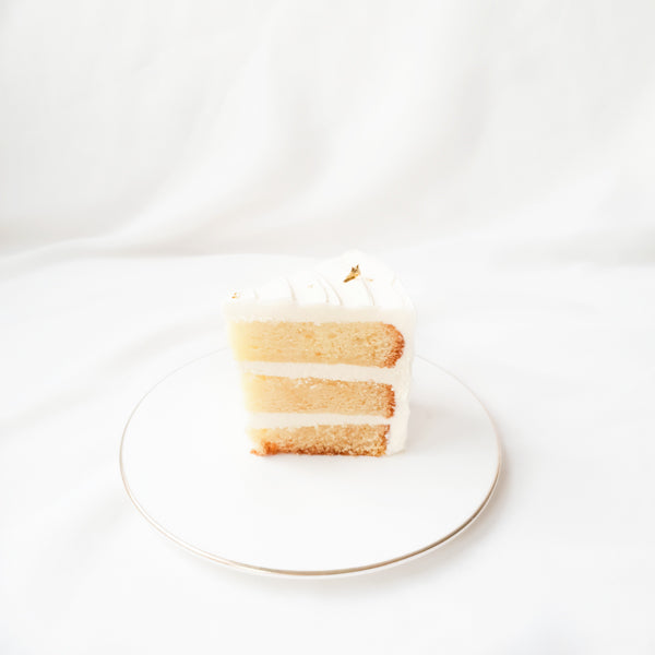 Soft vanilla slice frosted with silky vanilla bean buttercream